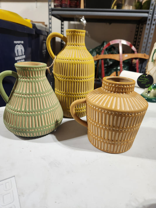 Bisque pots and shell